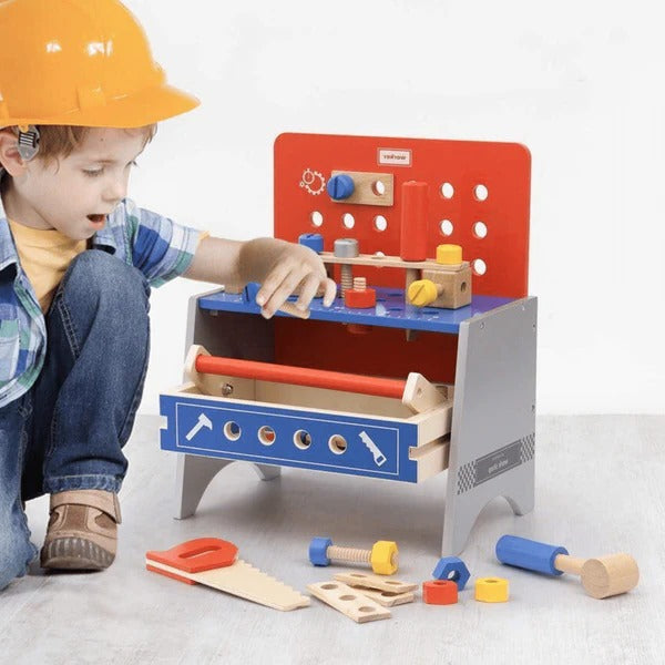 Realistic toy workbench with tools for children