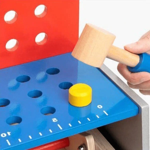 Realistic toy workbench with tools for children